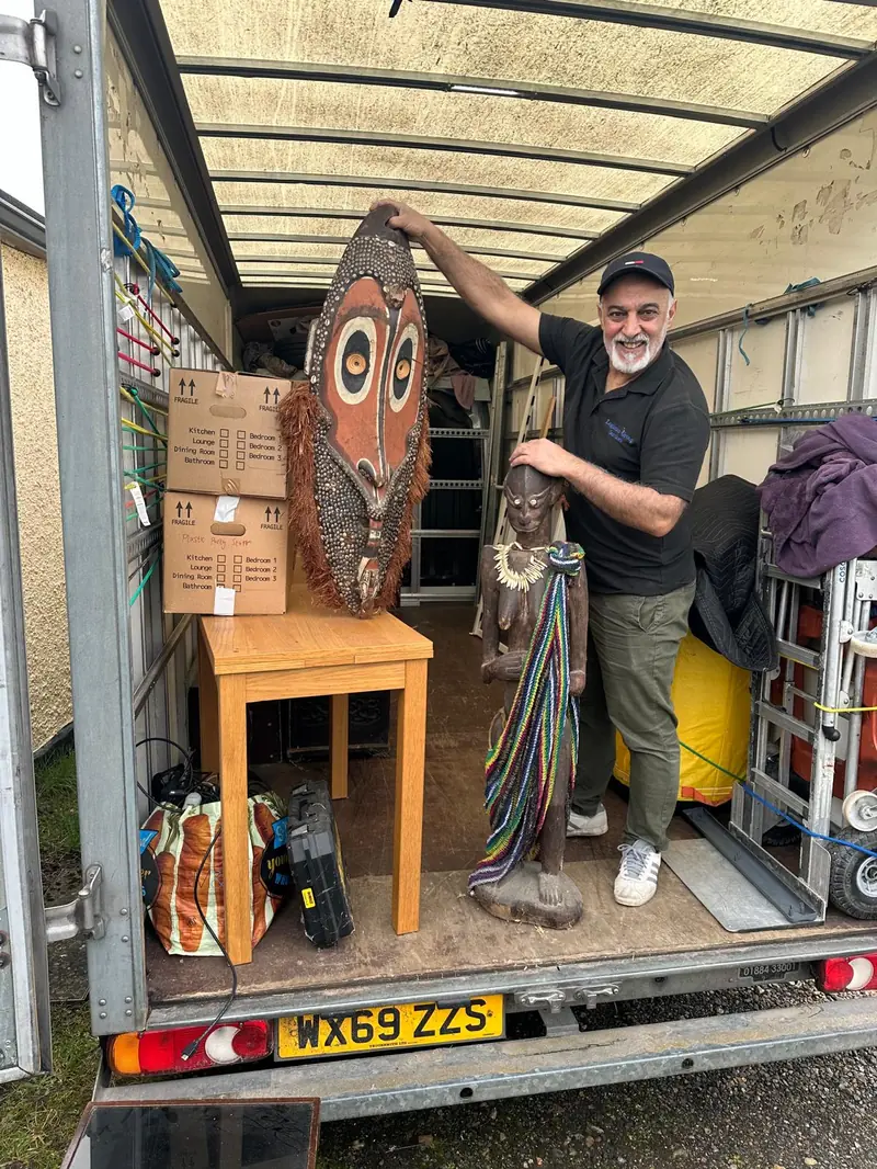 London Moverz driver with customer belongings loaded in van