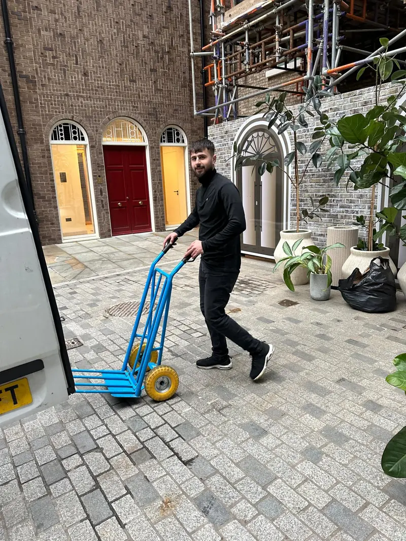 London Moverz team member with sack truck at London property
