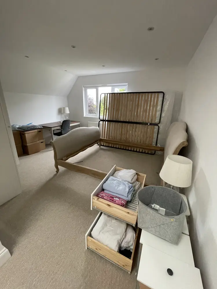 Bedroom furniture and boxes ready for moving day