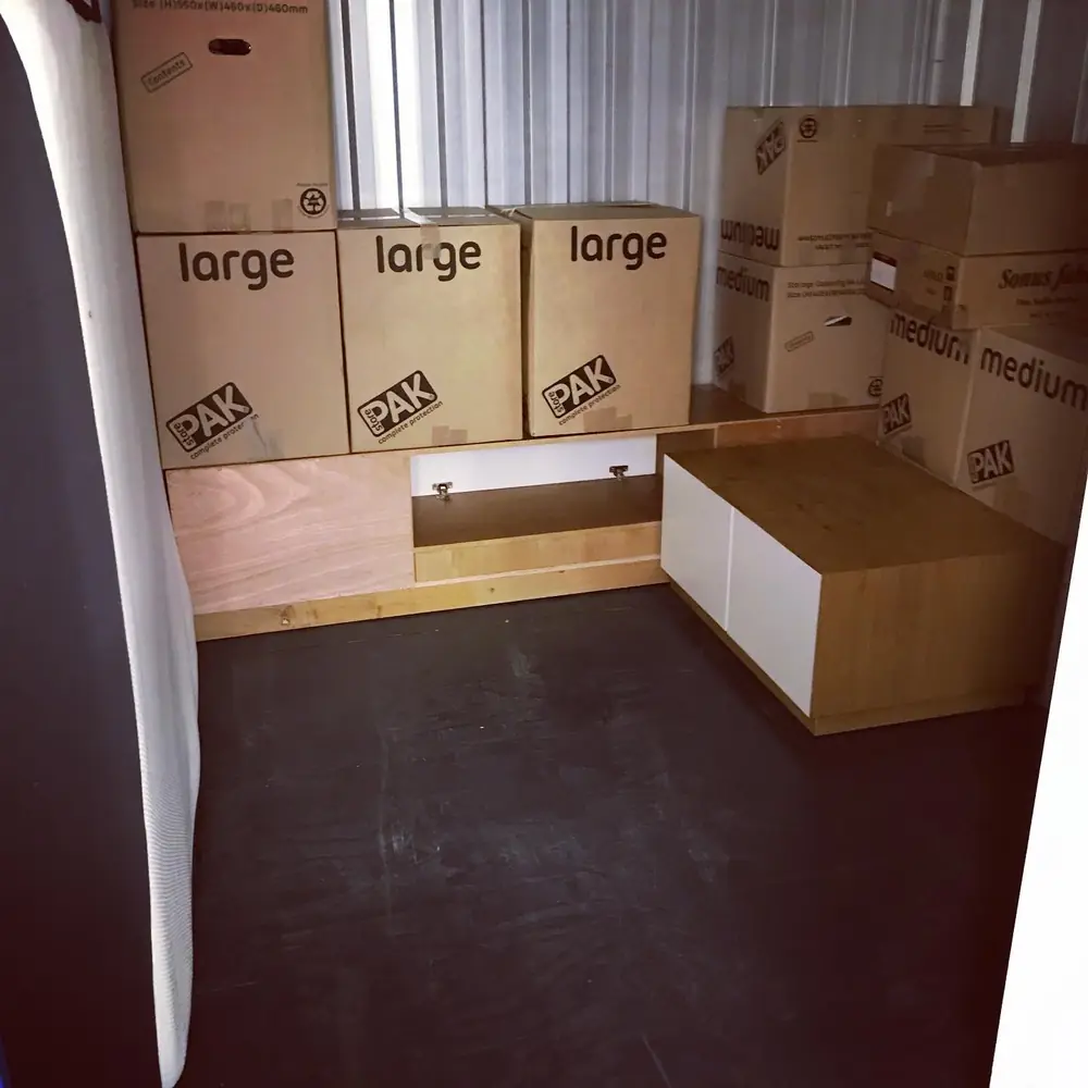 Large and medium boxes packed in a room