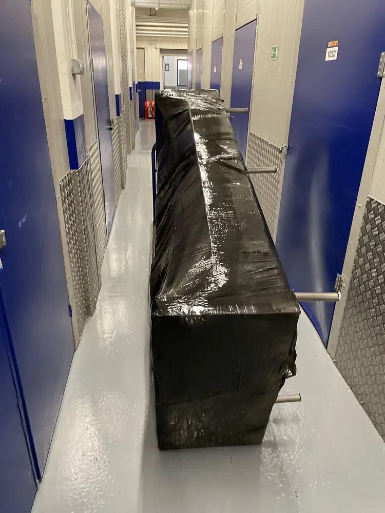 Wrapped furniture delivered to a self-storage unit