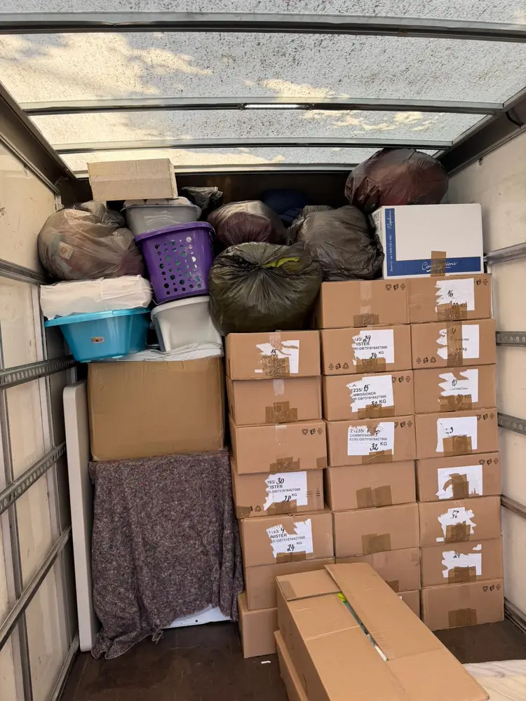 Boxes and bags loaded in the van