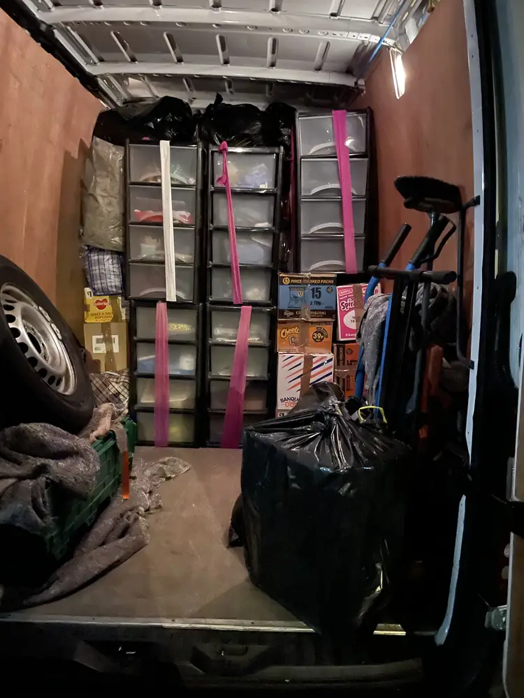 Furniture wrapped and strapped inside the London Moverz van