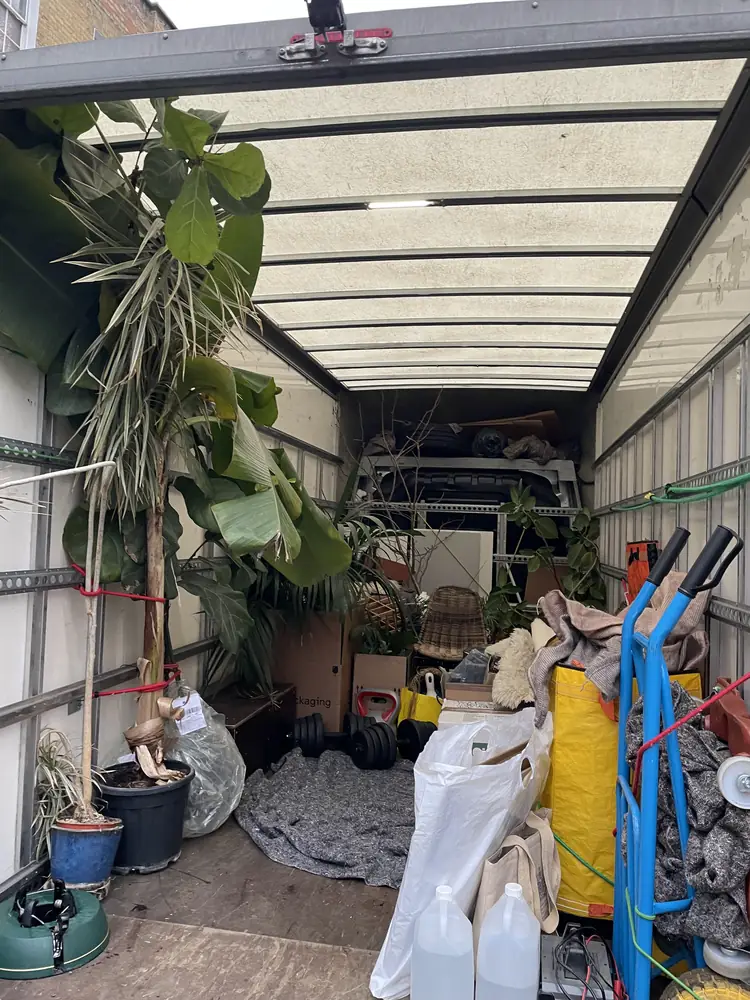 Plants and garden items loaded carefully in the van