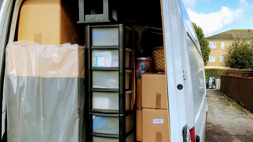 Wrapped shelving and boxes in the van